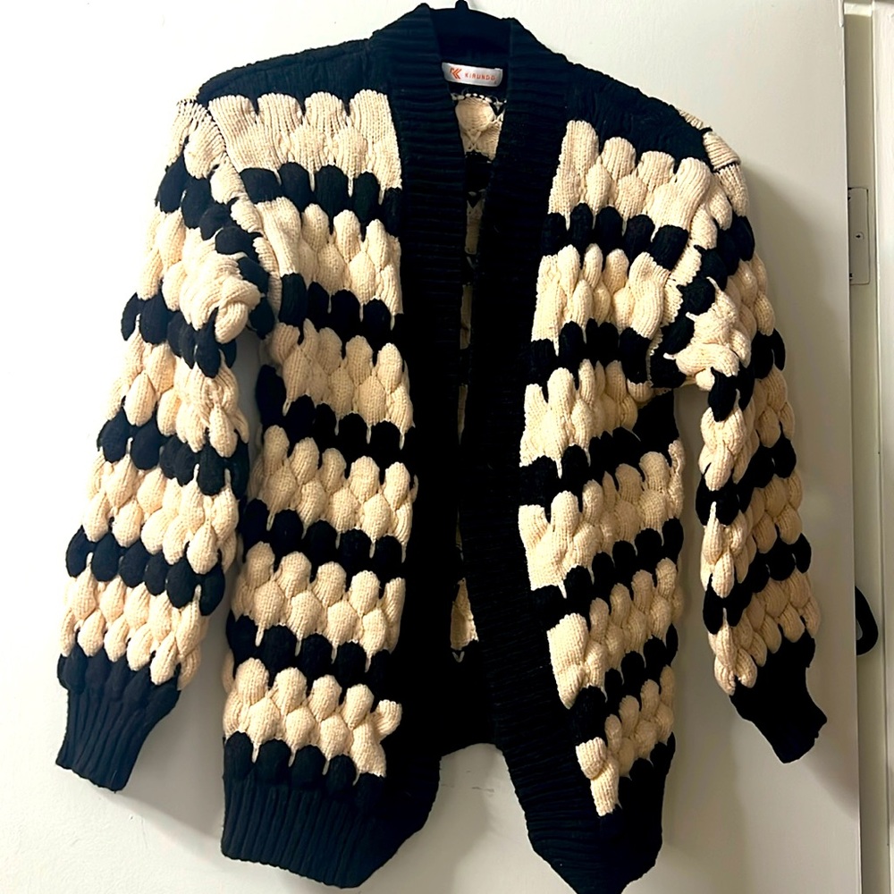 Cream and black puff stitch cardigan.